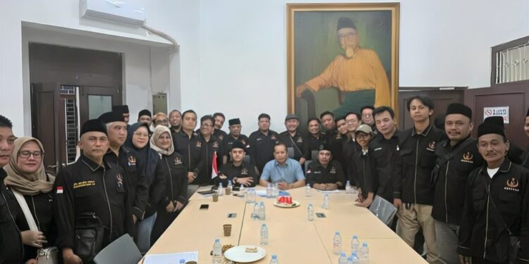 Suasana rapat Perisai Syarikat Islam saat pembentukan Koperasi Perisai SI. (Dok. Istimewa)